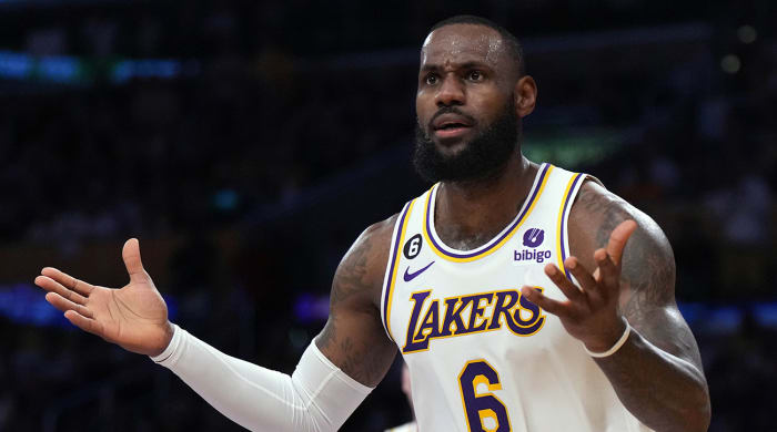 Lakers forward LeBron James (6) reacts in the second quarter against the Nuggets.
